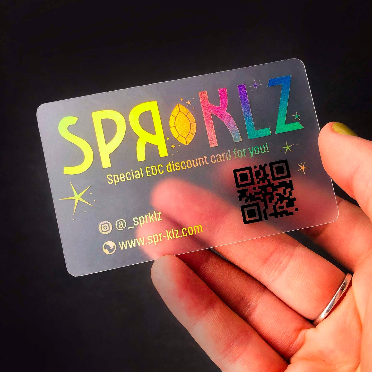 Translucent plastic business card with QR code for modern networking. Stand out with innovative design.