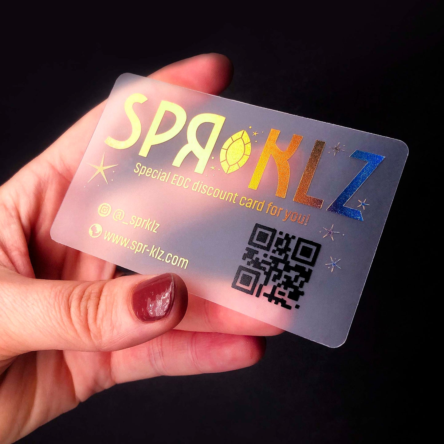 Translucent plastic business card with QR code for modern networking. Stand out with innovative design.